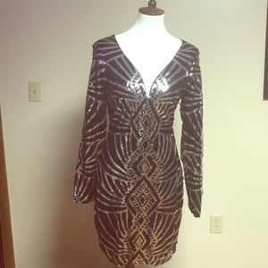 Black and silver sequined dress